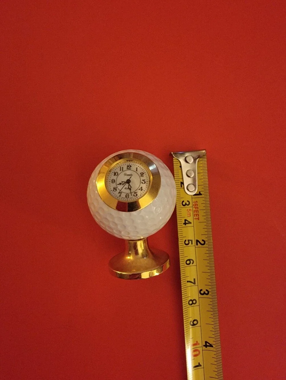 Xanadu Gold Accent White Golf Ball Table Clock